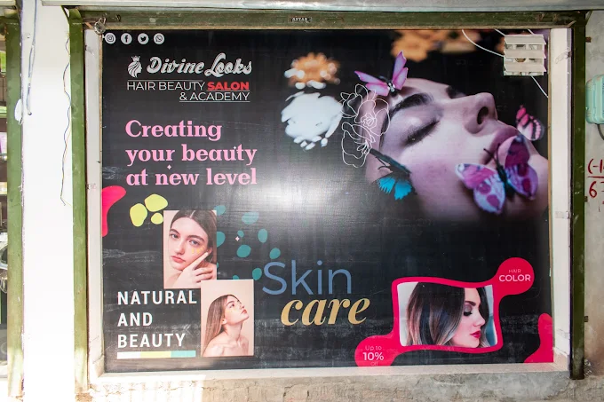 Divine looks Hair Beauty Salon and Academy logo