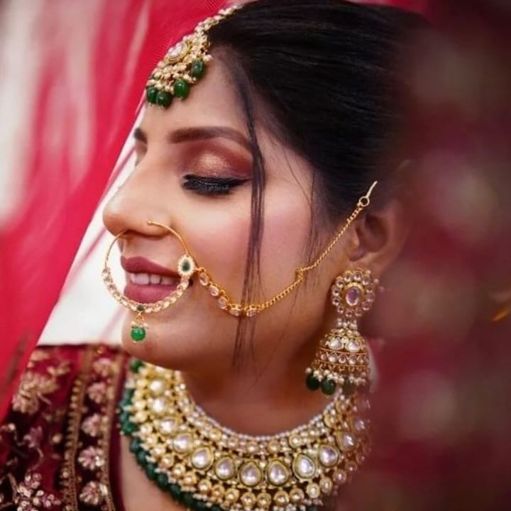 Yashika Makeup Studio and Academy logo